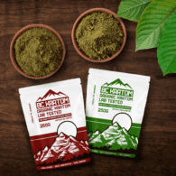 2x 250g BC Kratom bags laying on a wooden table beside two bowls of kratom powder